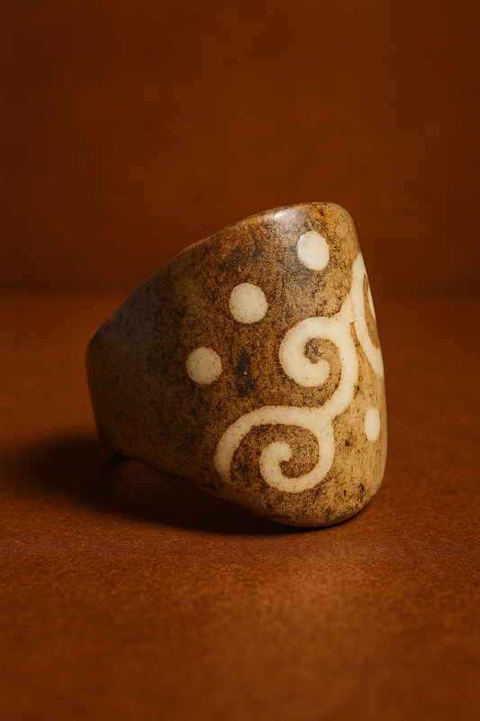 Decorative stone with white patterns on a brown background